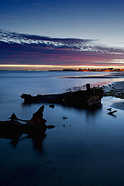 Shipwreck on beach at twilight, Altona, Victoria, Australia, Pacific