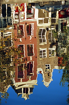 Reflection of Amsterdam houses in canal, Amsterdam, the Netherlands (Holland), Europe