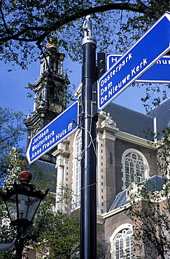 Close-up of direction sign for major sights along canal, Amsterdam, The Netherlands (Holland), Europe