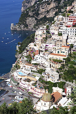 View of Positano with the typical majolica dome of Santa Maria Assunta, Costiera Amalfitana, UNESCO World Heritage Site, Campania, Italy, Europe