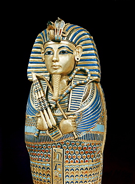 One of the four small gold mummiform coffins placed in the canopic urns, from the tomb of the pharaoh Tutankhamun, discovered in the Valley of the Kings, Thebes, Egypt, North Africa, Africa