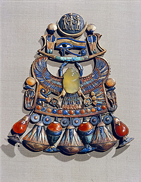 Pectoral in gold cloisonne with semi-precious stones and glass-paste, with winged scarab, symbol of resurrection, in centre, from the tomb of the pharaoh Tutankhamun, discovered in the Valley of the Kings, Thebes, Egypt, North Africa, Africa