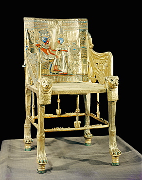 The gilt throne, the back decorated with a scene showing the royal couple, from the tomb of the pharaoh Tutankhamun, discovered in the Valley of the Kings, Thebes, Egypt, North Africa, Africa