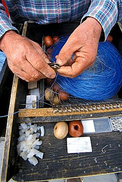 Fisherman at work, Livorno, Tuscany, Italy