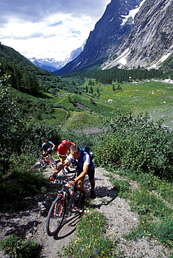 On bike on Gran Balconata, towards Bonatti alpine refuge, Ferret Valley, Valle d'Aosta, Italy