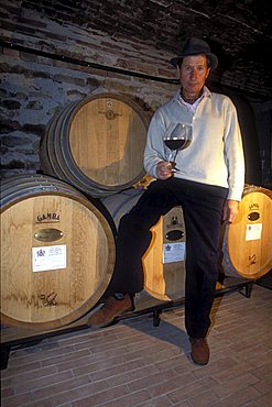 The Barolo grower G. Viberti in his wine vault, Cuneo, Piedmont, Italy.