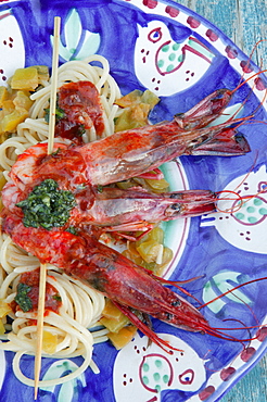 Spaghetti alla Chitarra pasta with big crawfishes and sea urchins, Orestorante restaurant, Ponza island, Lazio, Italy 