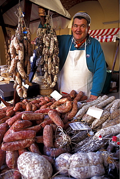 Sausage merchant at truffle fair, Villafranca d'Asti, Piedmont, Italy.