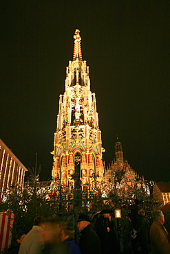 Christmas market and Schoner Brunnen fountain, Nurnberg, Bavaria, Germany, Europe