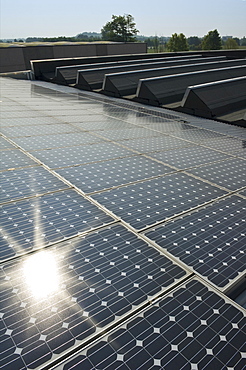 solar power system on factory, azzano san paolo, italy