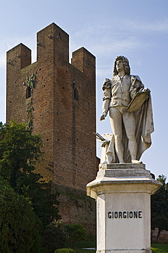 giorgione statue and tower, castelfranco veneto, italy