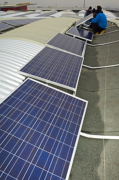 solar power system on factory roof, mapello, italy