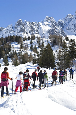 snowshoes and alpine ski, schilpario, italy