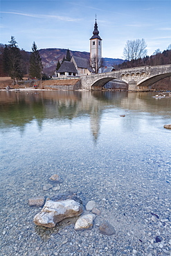 Church of Sv. John the Baptist and the stone bridge by the Bohinj lake, Upper Carniola, Slovenia, Europe