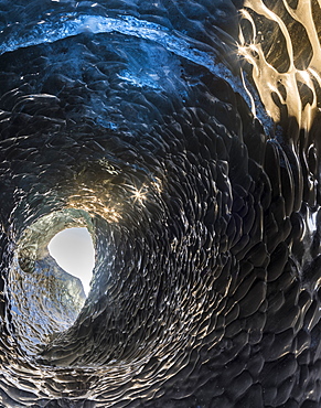 Ice cave in the glacier Breidamerkurjoekull in Vatnajoekull National Park. Entrance to the Ice Cave. europe, northern europe, iceland,  February