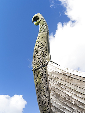 The island of Unst, Replica of a viking vessel near Haroldswick. The ship was sailed from Sweden to Shetland in the year 2000 and is now owned by the Shetland Amenity Trust and is part of the  Viking Unst Project.  europe, central europe, northern europe, united kingdom, great britain, scotland, northern isles,shetland islands, May