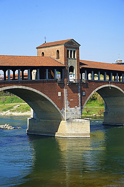 The historic and ancient covered bridge over the Ticino river, Pavia, Lombardy, Itay, Europe