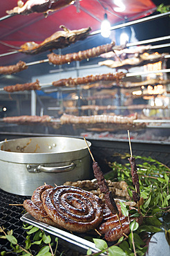 Sartizzu arrustiu rost Sausage, Cordula made up of braided and cooked kid or lamb intestines wrapped around a spit, typical Sardinia recipe, Campidano, Sardinia, Italy, Europe