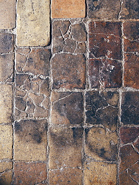 Detail of the ancient pavement inside one of the rooms of the hotel Le Grotte della Civita, it is a hotel housed in ancient cave houses by the projects of "Sextantio" Matera, Basilicata, Italy, Europe