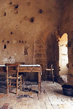 Dining rooms of the hotel Le Grotte della Civita, It is a hotel housed in ancient cave houses by the projects of "Sextantio", Matera, Basilicata, Italy, Europe