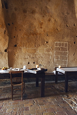 Dining rooms of the hotel Le Grotte della Civita, It is a hotel housed in ancient cave houses by the projects of "Sextantio", Matera, Basilicata, Italy, Europe