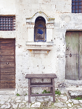 Ancient entrance gates to the cave houses in Matera into the Sassi. The Sassi di Matera are ancient cave dwellings in the Italian city of Matera, Basilicata. Situated in the old town, they are composed of the Sasso Caveoso and the later Sasso Barisano. Matera, Basilicata, Italy, Europe