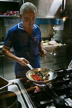 Chef at work in the kitchen of the restaurant 1999, Maratea, Basilicata, Italy, Europe