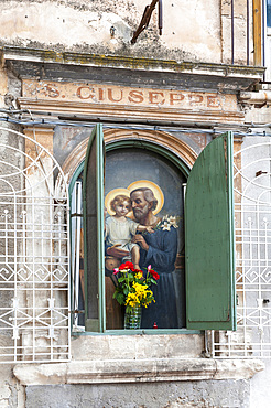 Votive shrine on the side of Palazzo Salemi in Piazza del Monumento, city of Modica, Ragusa, Sicily, Italy, Europe; UNESCO World Heritage Site