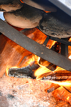 Panigaccio is a type of round, unleavened bread, baked in a special terracotta and mica dish, called testo, red-heated over high heat in a bonfire or in a wood-burning oven. A batter of flour, water and salt is interposed between one text and another, to form a pile. It is typical of the Lunigiana land on the border between Liguria and Tuscany, Italy, Europe