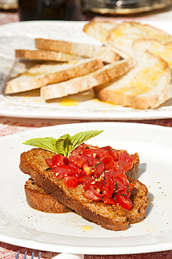 A bruschetta: bread, oil and tomato at the Le Terre di Poreta farmhouse in the hamlet of Poreta; Spoleto; Perugia; Italy; Europe