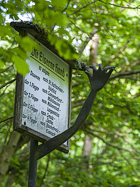 Old Signpost Eiserne Hand (iron hand). The woodland Hainich in Thuringia, National Park and part of the UNESCO world heritage - Primeval Beech Forests of the Carpathians and the Ancient Beech Forests of Germany. Europe, Central Europe, Germany, Thuringia