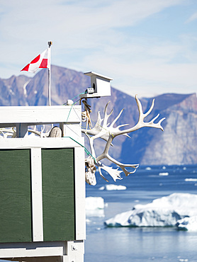 The town Uummannaq in the north of West Greenland, located on an island in the Uummannaq Fjord System. America, North America, Greenland