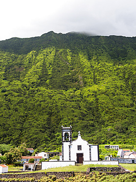 The church in the Faja da Caldeira de Santo Cristo . Sao Jorge Island, an island in the Azores (Ilhas dos Acores) in the Atlantic ocean. The Azores are an autonomous region of Portugal. Europe, Portugal, Azores