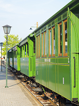 Historic railway Chiemsee-Bahn in the harbour of Prien. Lake Chiemsee in the Chiemgau. The foothills of the Bavarian Alps in Upper Bavaria, Germany