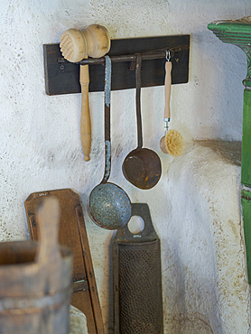 Kitchen with utensils. Interiour of a historic farmhouse. Open Air Museum Finsterau, Bavarian Forest, Germany, Europe