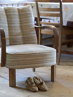 Old chair. Interiour of a historic farmhouse. Open Air Museum Finsterau, Bavarian Forest, Germany, Europe