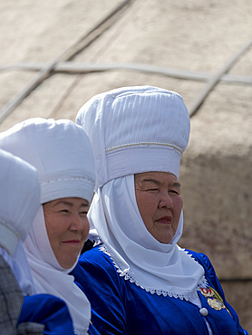 Participant in traditional garb. Folk Festival commemorating the origin myth the Tien Shan Maral (Tian Shan wapiti), an origin myth of the Kyrgyz tribes. Near Tasch Baschat, Naryn region. Asia, Central Aisa, Kyrgyzstan