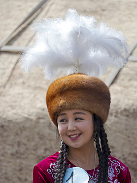 Musican in traditional garb. Folk Festival commemorating the origin myth the Tien Shan Maral (Tian Shan wapiti), an origin myth of the Kyrgyz tribes. Near Tasch Baschat, Naryn region. Asia, Central Aisa, Kyrgyzstan