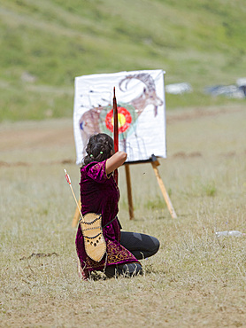 Traditional archery. Folk and Sport festival on the Suusamyr plain commemorating Mr Koshomkul, a sportsman and folk hero of the last century. Asia, central asia, Kyrgyzstan