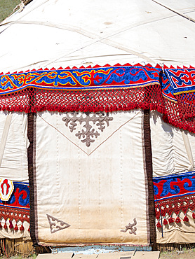 Traditional Yurt. Folk and Sport festival on the Suusamyr plain commemorating Mr Koshomkul, a sportsman and folk hero of the last century. Asia, central asia, Kyrgyzstan