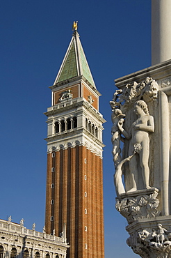 The Campanile with carved stone detail on the Palazzo Ducale, Venice, UNESCO World Heritage Site, Veneto, Italy, Europe