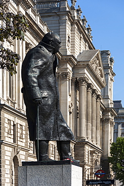 Statue of Sir Winston Churchill, Parliament Square, Parliamentary Buildings in background, London, England, United Kingdom, Europe