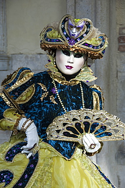 Lady in blue and gold, with fan, Venice Carnival, Venice, Veneto, Italy, Europe