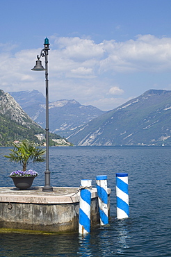 View to the north from the harbour mouth, Limone, Lake Garda, Italian Lakes, Lombardy, Italy, Europe