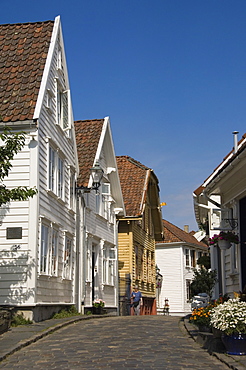 A street of wooden houses in the old town area adjacent to the harbour, Stavanger, Norway, Scandinavia, Europe