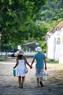 Couple walking in the historic part Paraty (Parati), Rio de Janeiro State, Brazil, South America 