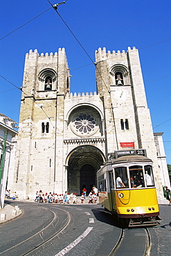 Electrico (electric tram) in front of the Se Cathedral, Lisbon, Portugal, Europe