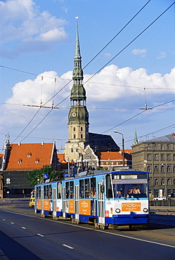 Tram, with St. Peter church in the background, Riga, Latvia, Baltic States, Europe