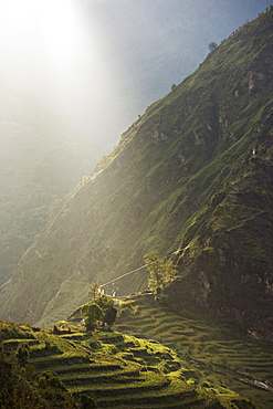 Sunset over high terraced hills, close to Tibet on the trade route above the Arniko river, Nepal, Asia