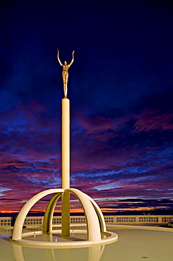 Art Deco statue at sunrise over the Pacific Ocean, Napier, North Island, New Zealand, Pacific